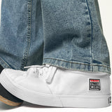 Sneakers montantes en toile - Blanches