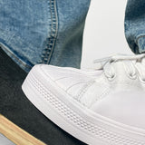 Sneakers montantes en toile - Blanches