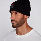 Tuque à revers avec écusson large à logo- Noire